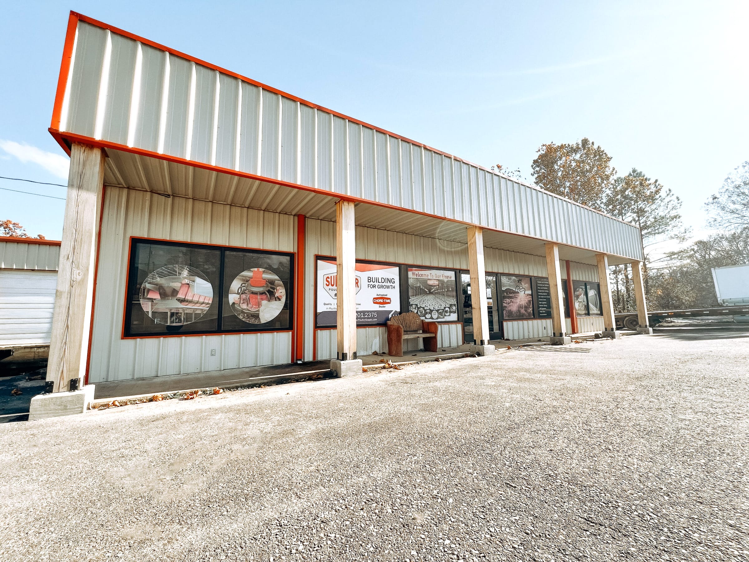Superior Poultry Supply storefront with red trim on South Main Street
